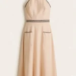 Vestido Lino Sin Manga Escote Espalda Con Detalles En Bolsillo Y Contorno De Cintura Color Beige